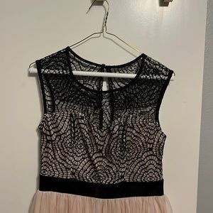 Sweet laced dress with toile skirt in perfect condition and only worn once.